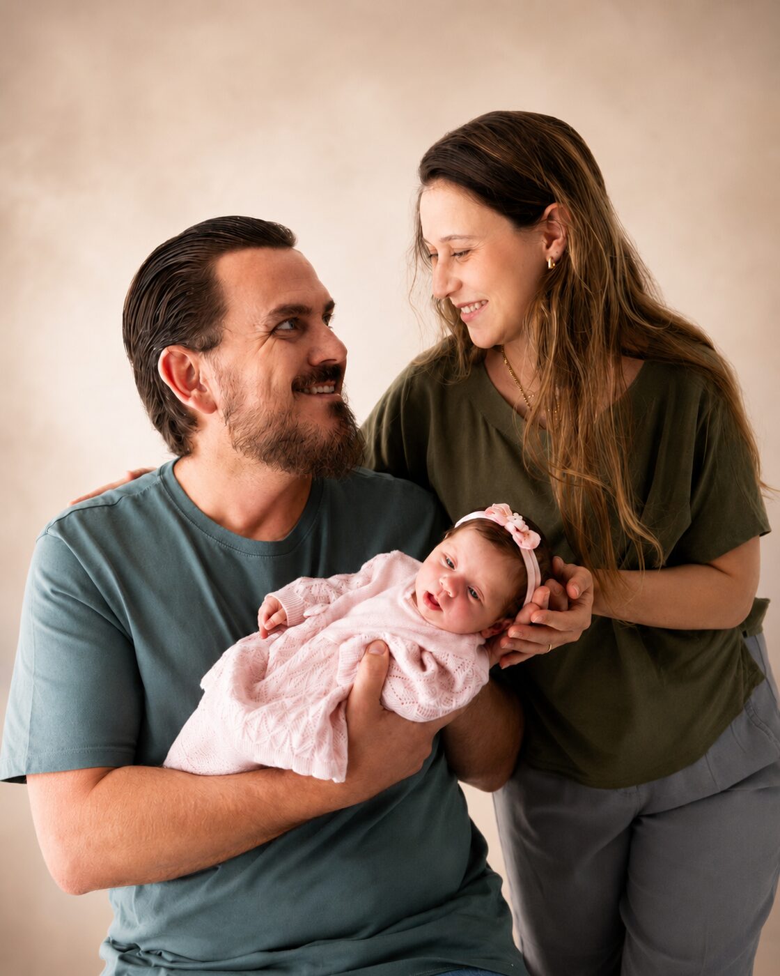 Dr. Clairton e Dra. Julia Laguna Dumke com a filha Clarice
